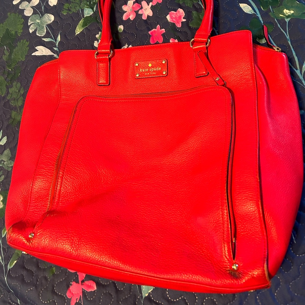 Large Kate Spade purse. Gently used with some normal wear and tear.